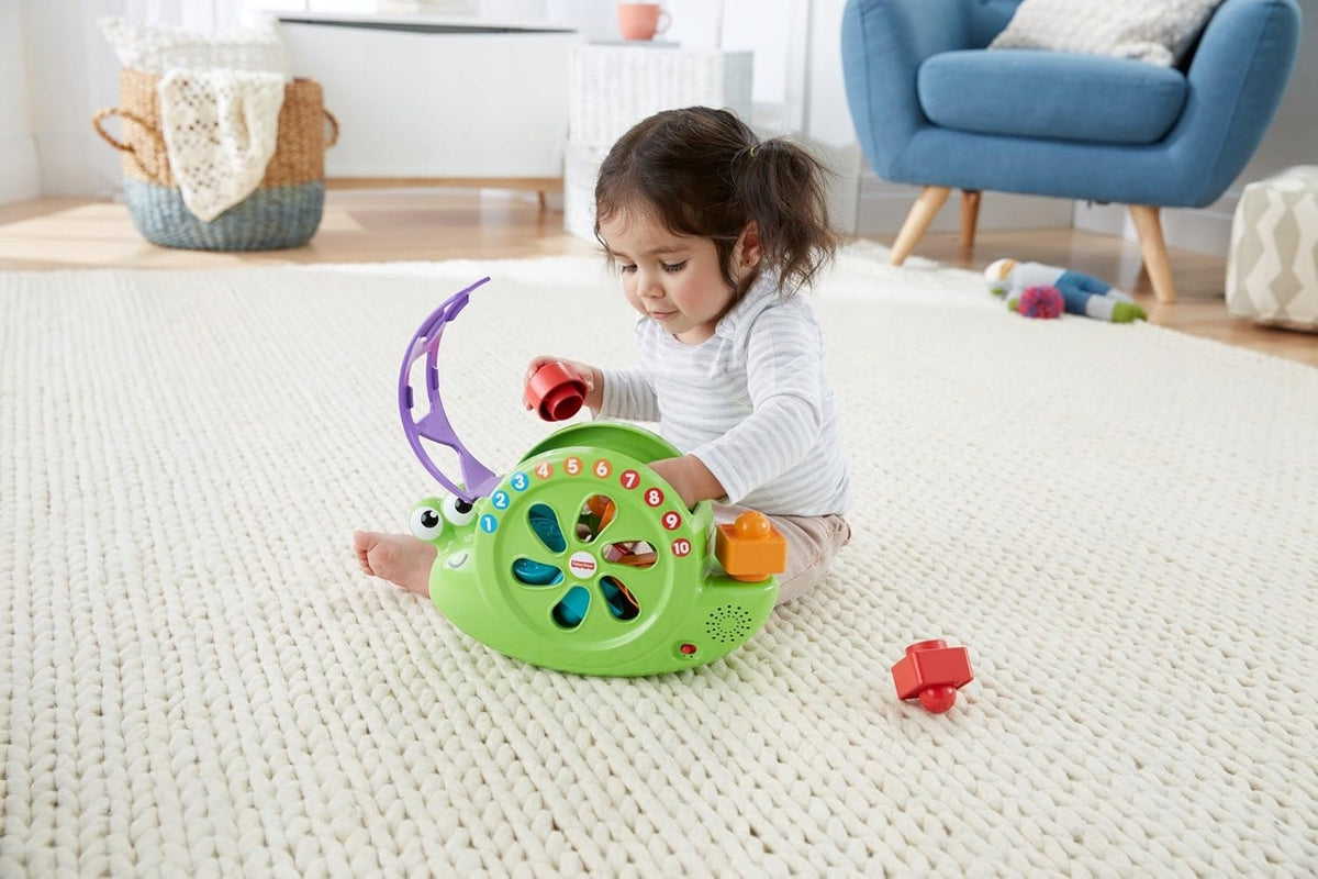 FISHER-PRICE FRB88 interaktiv musikalisk snigel TYSKT SPRÅK