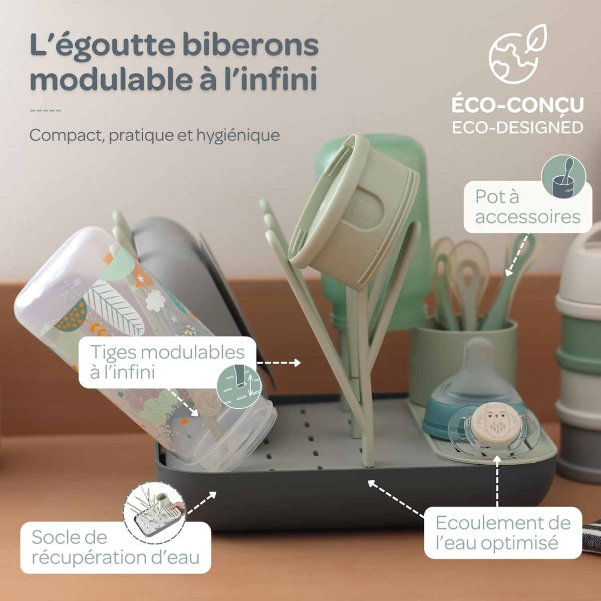 Grafika poglądowa: ociekacz z butelkami, pojemnikami i nożyczkami, ze strzałkami wskazującymi jego elementy.