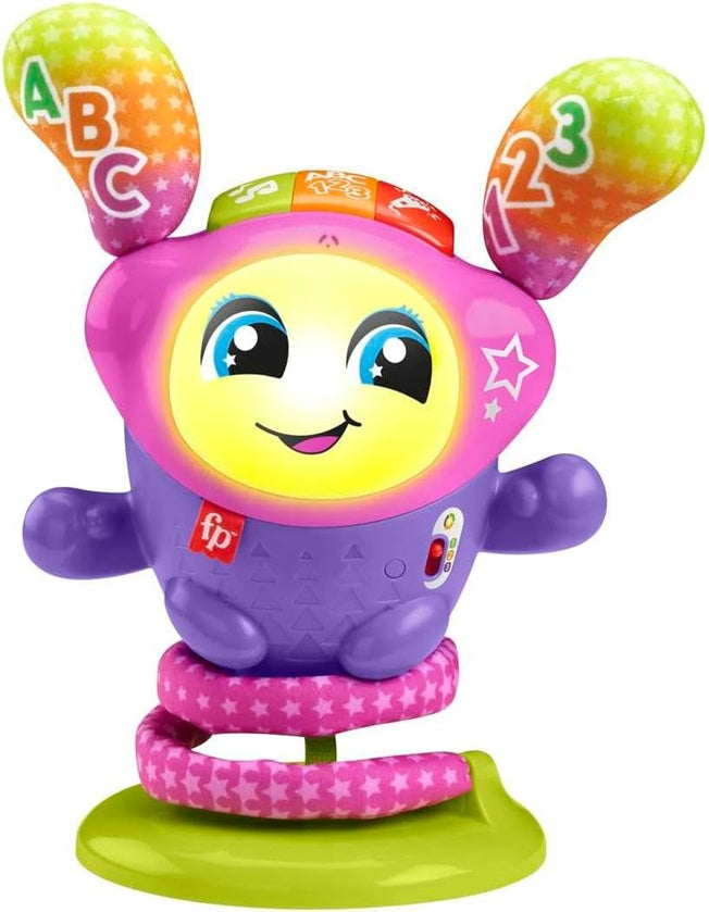 Fioletowo-różowa zabawka z uśmiechniętą buzią, długimi uszami i zieloną podstawą.