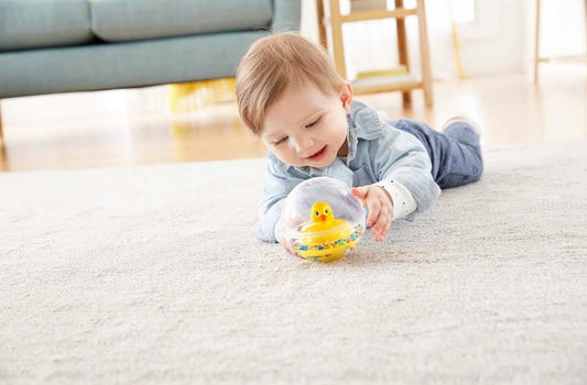 FISHER-PRICE DVH21 pelota rodante con patito 10 cm