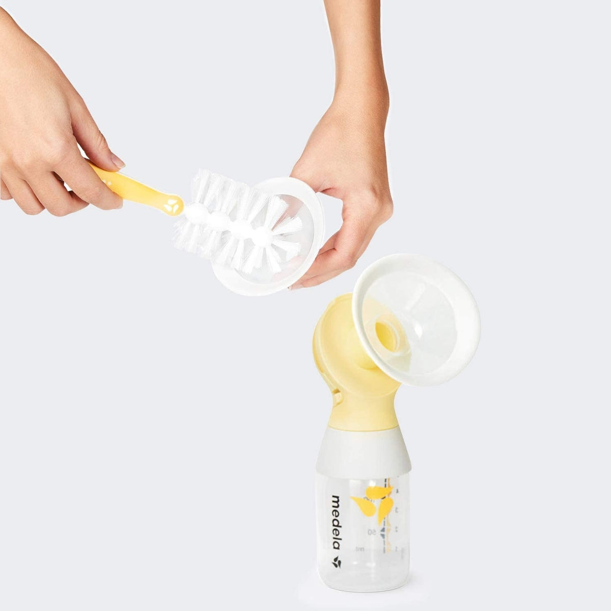 MEDELA Swing Maxi Flex podwójn laktator 2-fazowyU1, żółty laktator elektryczny z butelką i szczotką do czyszczenia