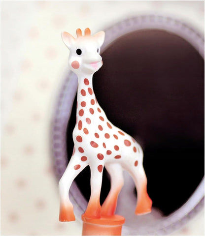 TROUSSELIER uppvridbar speldosa självlysande i mörkret SOPHIE LA GIRAFE